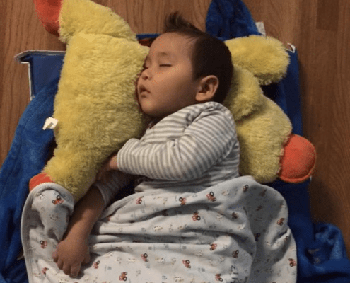 Child sleeping at a Kirkland Montessori School