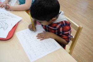 Montessori Kirkland, WA boy writing