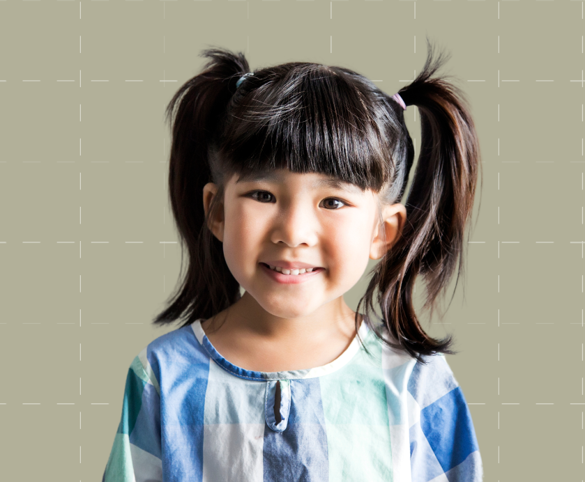 Little girl with pigtails.